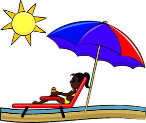 attractive young woman lying in the sun on vacation by the beach getting suntan