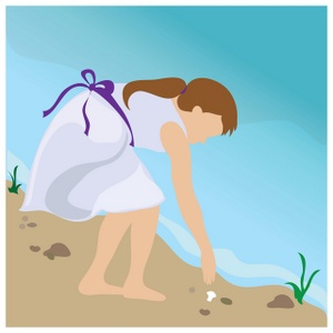 child a girl beachcombing for seashells at the waters edge