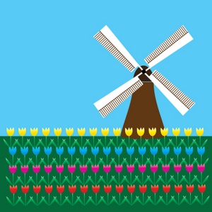 dutch windmill with a field of colorful tulips in the foreground
