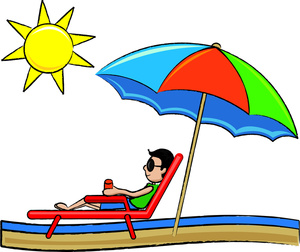 man relaxing while on vacation in a tropical paradise by the beach
